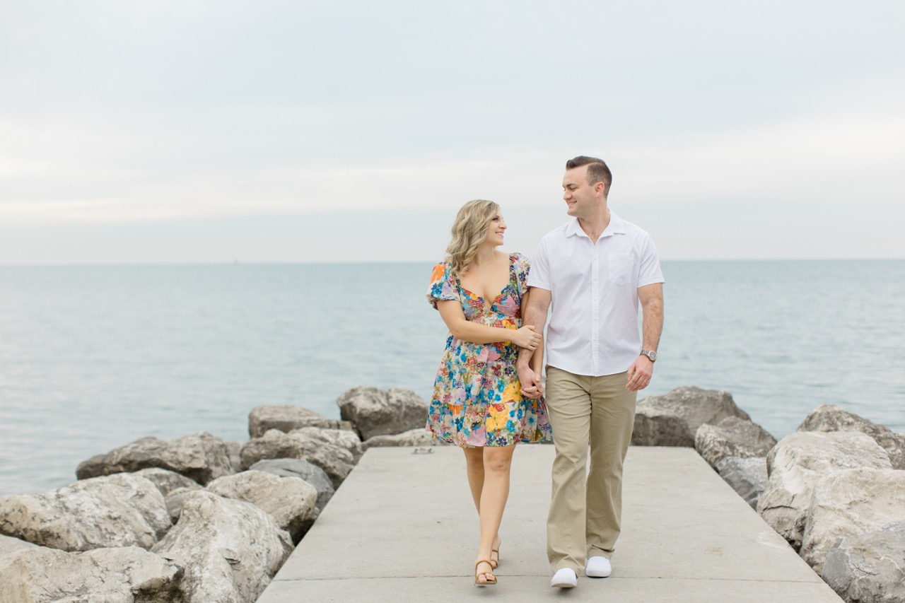 A couple posing for their engagement session at Edgewater Park in Cleveland Ohio
